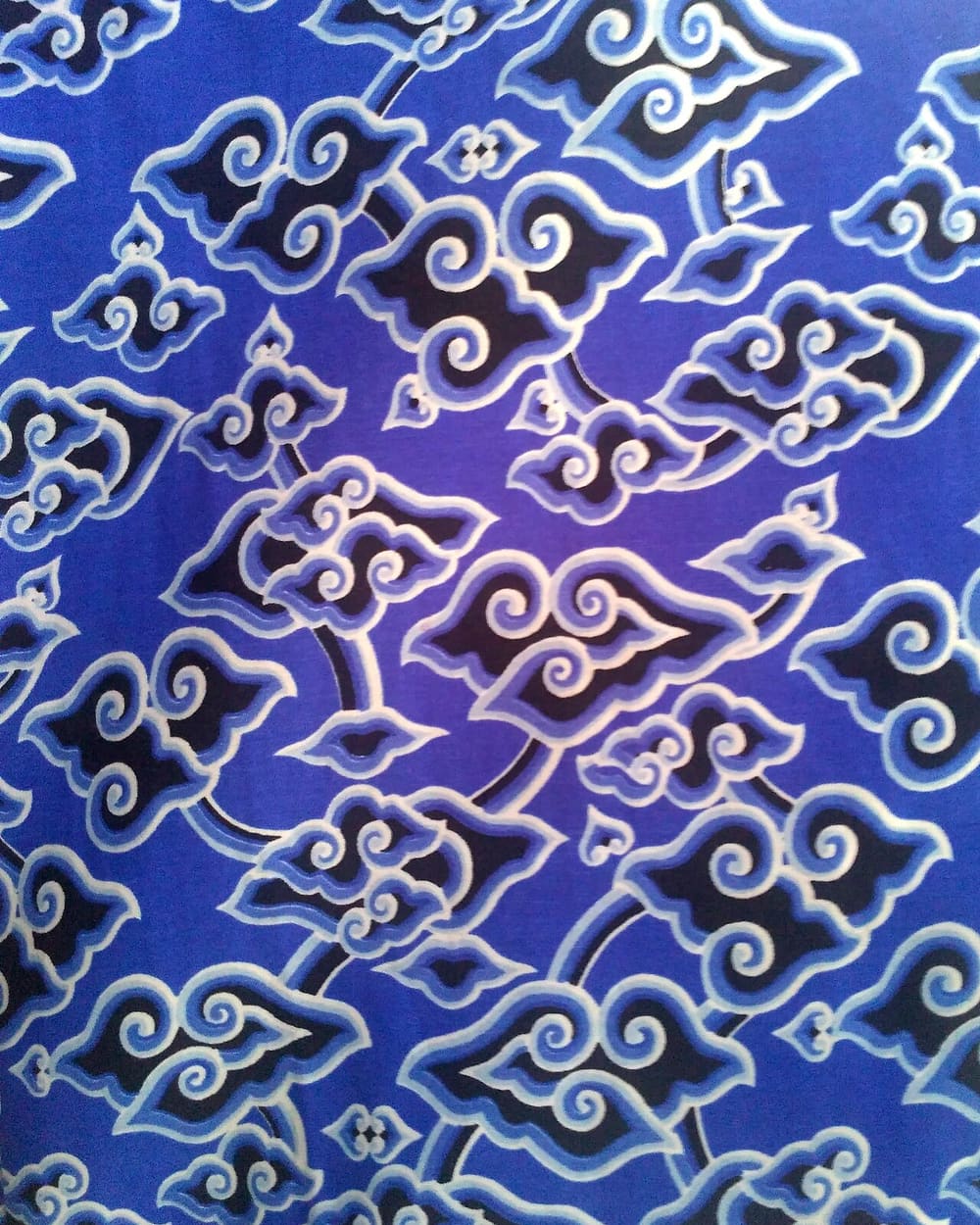 Cirebon megamendung batik with layered cloud motif in blue